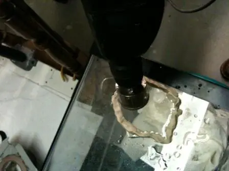 How to drill a glass aquarium: Start with your drill bit at an angle to create the first groove
